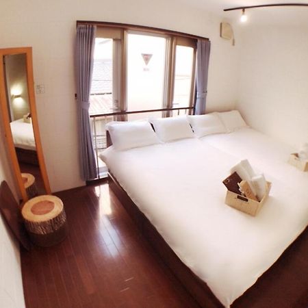 Osaka Sinsei Guest House Extérieur photo