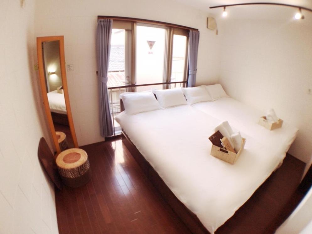 Osaka Sinsei Guest House Extérieur photo
